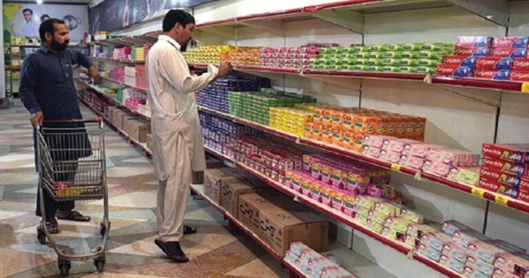 People shopping at utility store